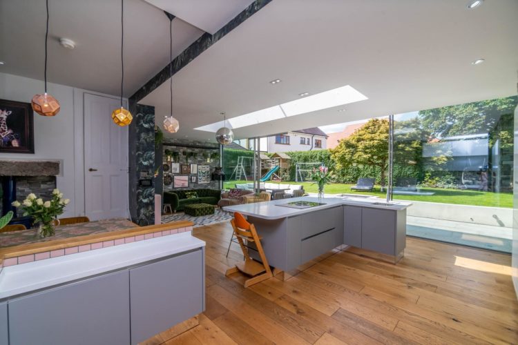 Traditional property with award winning Ultraline sliding doors in modern extension