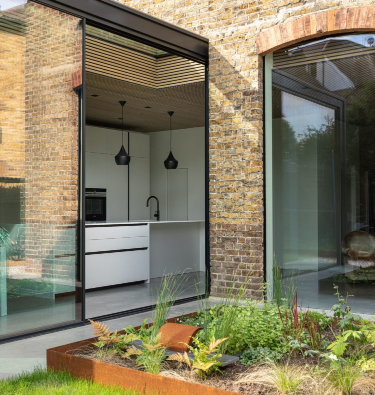 Kirkstall Road Ultraline black seamless sliding doors installation