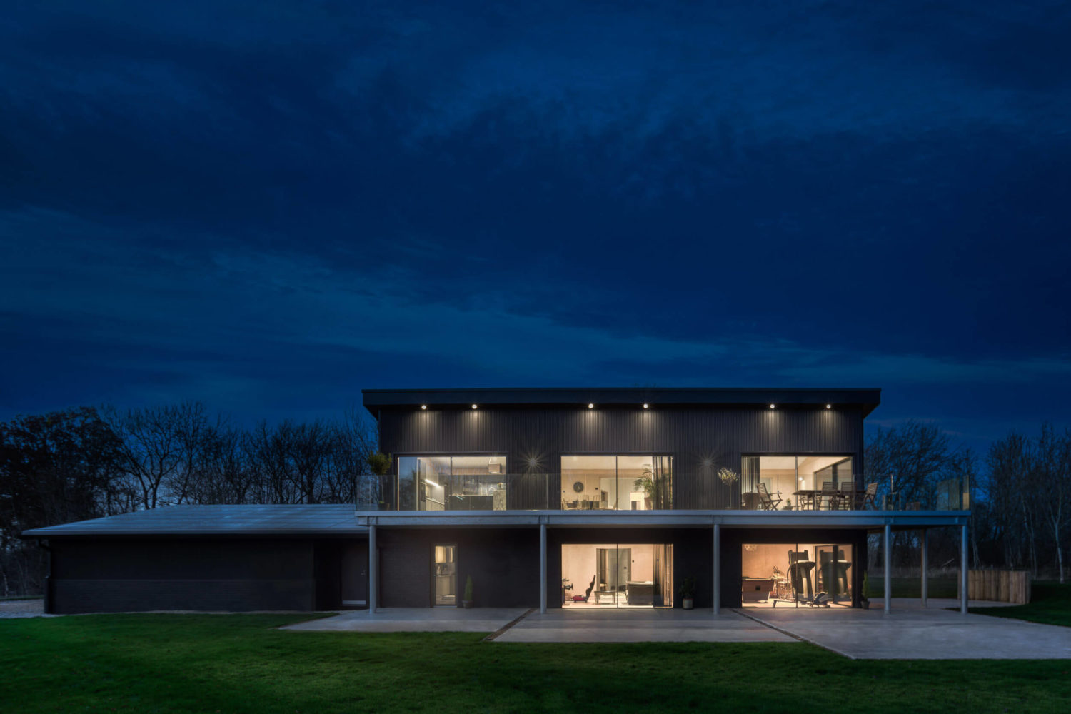 Black ultraline sliding doors with black cladding new build