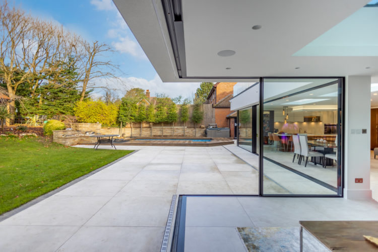 Ultraline black frameless sliding patio doors installation Chislehurst