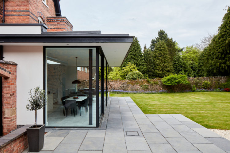 4 panel Ultraline sliding doors with frameless look installation modern glass box installation