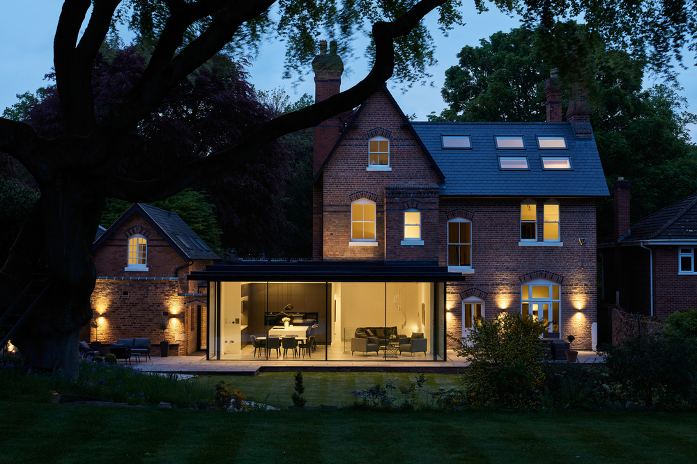 4 panel Ultraline sliding doors with frameless look installation modern glass box installation