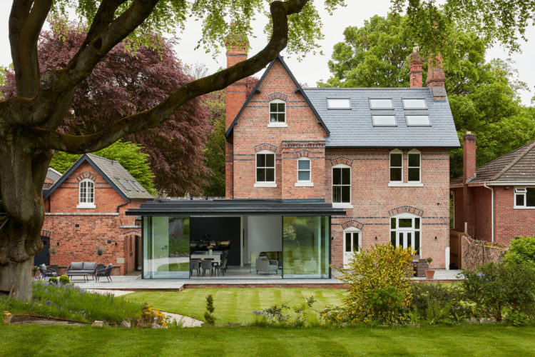 4 panel Ultraline sliding doors with frameless look installation modern glass box installation