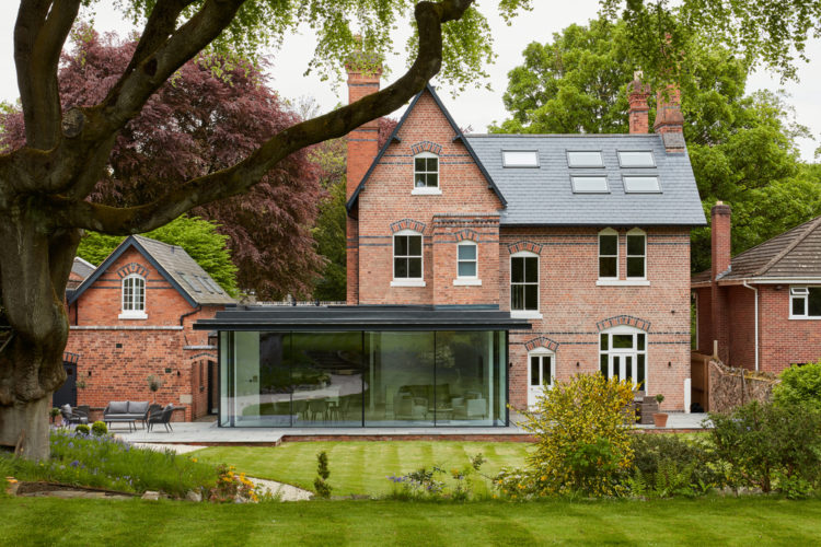 4 panel Ultraline sliding doors with frameless look installation modern glass box installation