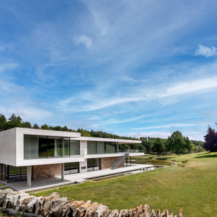 Modern new build Ultraline sliding door installation opening corner sliding doors